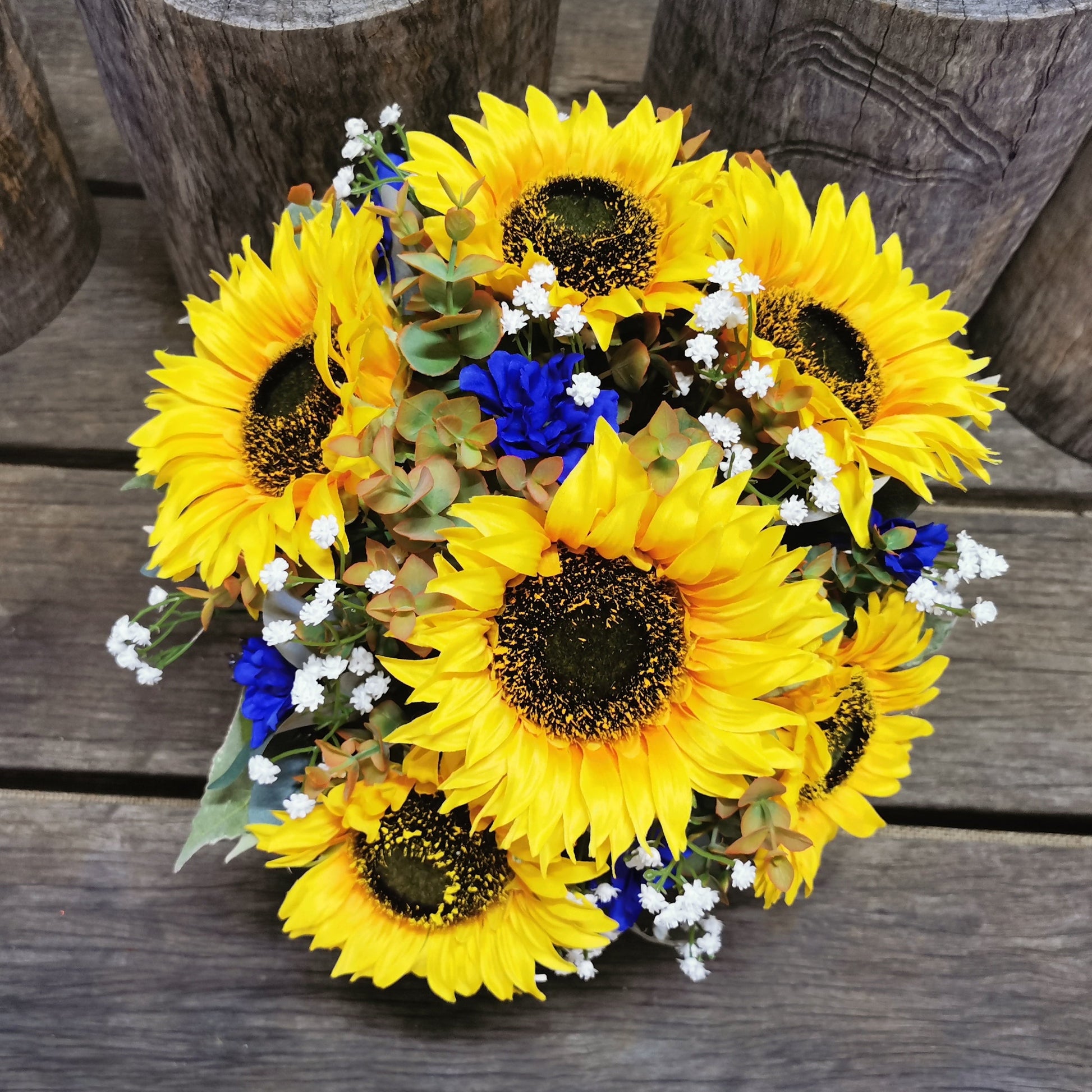 Bouquet of sunflowers and navy blue flowers 